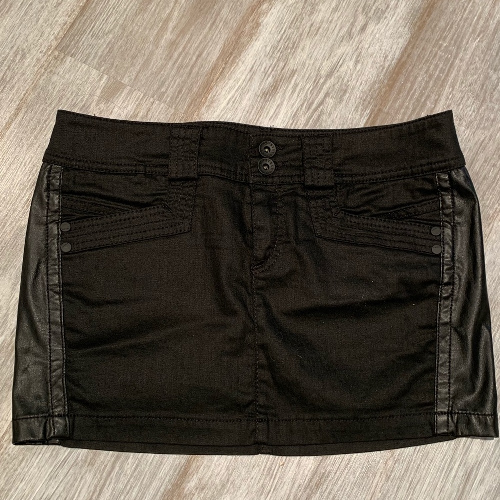 Sisley black mini skirt with faux leather accents